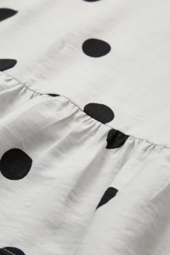Jade - Peplum bluse med trekvartærmer og polka prikker